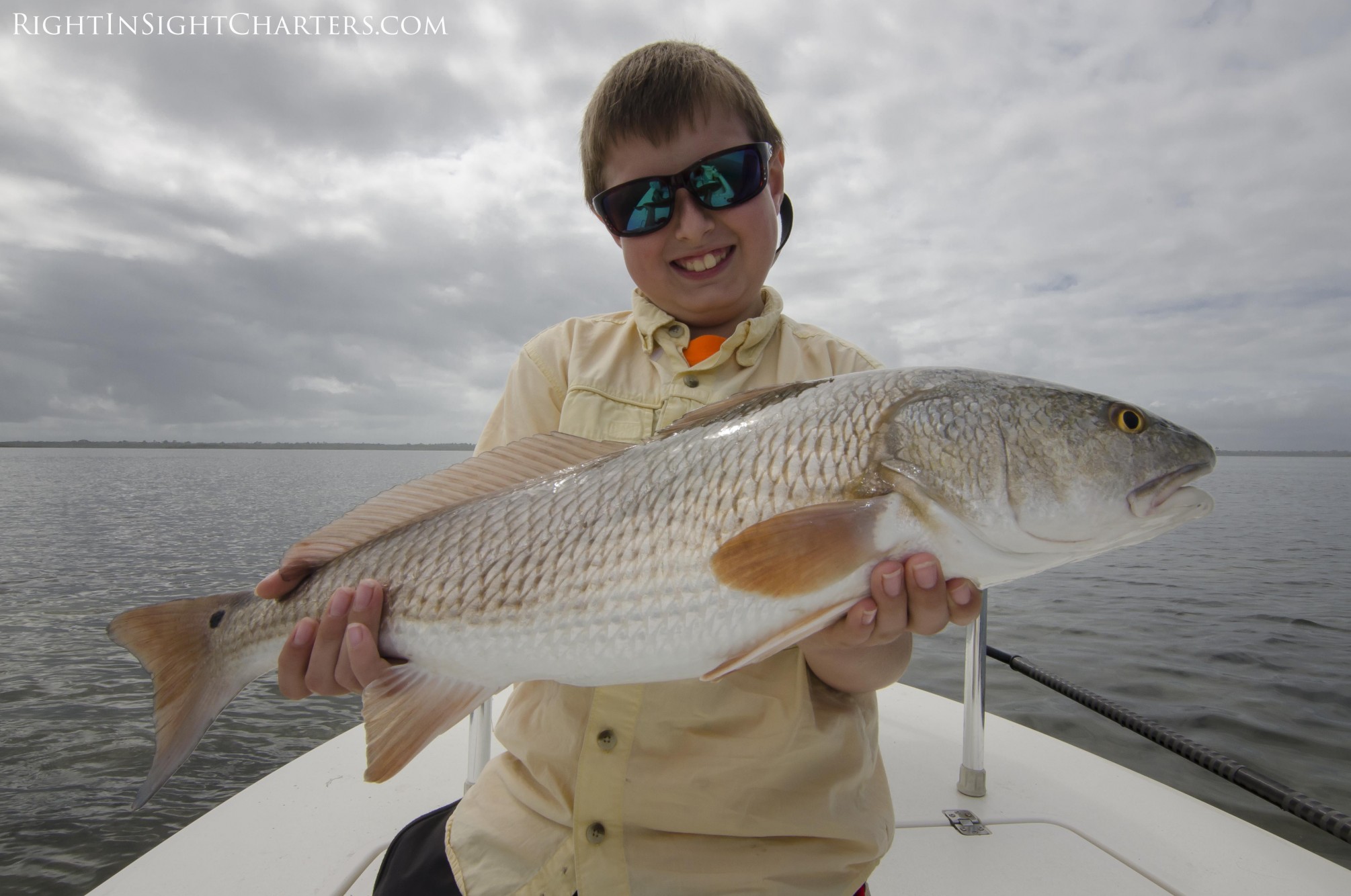 redfish-kids fishing trips-east cape skiffs-right in sight charters-mosquito lagoon-indian river lagoon-new smyrna beach-red drum-sight fishing-flats fishing-space coast